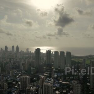 PD0527 - Dramatic Cloudy Sky Over the Mumbai Cityscape and Sea