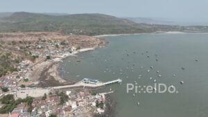 PD0514 - Aerial View of a Coastal Fishing Village and Bay