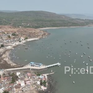 PD0514 - Aerial View of a Coastal Fishing Village and Bay