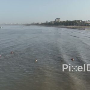 PD0506 - Tourists Swimming in the Ocean at Mumbai's Juhu Beach