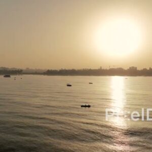 PD0503 - Mumbai at Dawn: Boats Silhouetted Against a Golden Sunrise