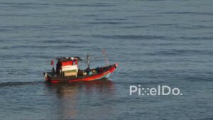 PD0502 - Aerial View of a Traditional Fishing Boat at Sea in Mumbai