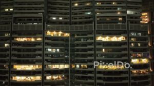 PD0543 - A Glimpse into Urban Living: High-Rise Apartment Building at Night