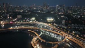 PD0541 - Illuminated Mumbai: Aerial of Haji Ali and the Coastal Road at Night