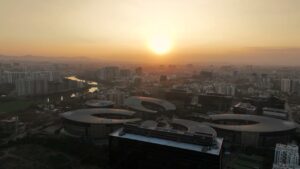 PD0536 - Aerial Orbit of EON IT Park and World Trade Center in Pune at Sunset