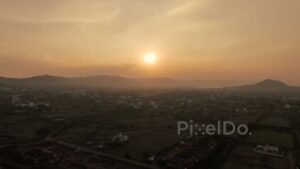 PD0589 - Golden Sunset Over a Town in a Mountain Valley