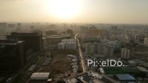 PD0586 - Golden Haze Engulfing a Modern Business District at Sunset