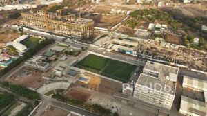 PD0583 - Building a New Neighborhood: An Aerial of a School and High-Rise Construction