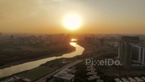 PD0582 - Golden Sunset Over a Winding River Through Pune City