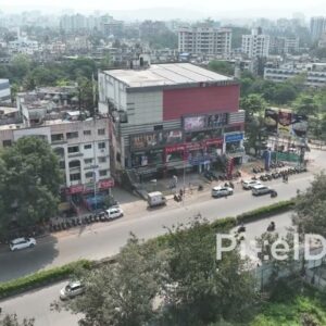 PD0599 - Aerial View of a Local Shopping Center and Cinema in a Small City