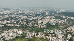 PD0596 - Sprawling Urban Landscape of Pune Under a Hazy Sky