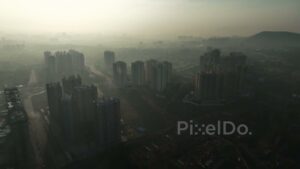 PD0591 - Atmospheric Aerial of a City Waking Up in Thick Haze