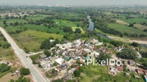 PD0623 - Picturesque Riverside Village in a Lush Green Valley