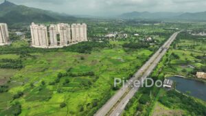PD0644 - Mumbai-Pune Expressway with Hiranandani Development and Mountain Backdrop