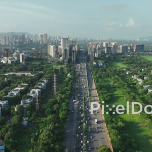 PD0649 - Green Urban Corridor: An Aerial View of a Major City Expressway