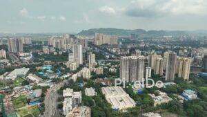 PD0642 - Urban Sprawl at the Foot of a Mountain Range