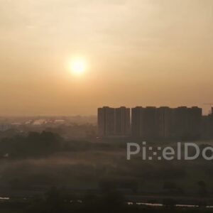 PD0641 - Misty Morning Sunrise Over a Hazy Urban Landscape