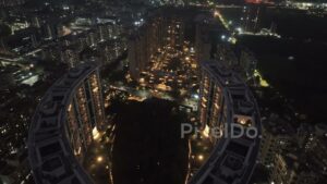 PD0639 - Modern Urban Living: An Aerial of a Glowing Residential Community