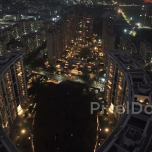 PD0639 - Modern Urban Living: An Aerial of a Glowing Residential Community