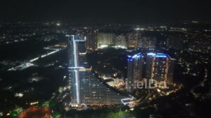 PD0636 - Futuristic High-Rise Architecture: An Aerial of Amanora Gateway Towers at Night