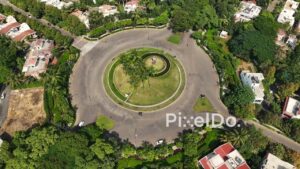 PD0635 - Top-Down Aerial of a Landscaped Roundabout in an Upscale Suburb