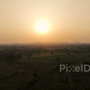 PD0626 - Hazy Golden Sunset Over a Vast Rural Landscape