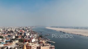 PD0654 - Sweeping Aerial View of Varanasi's Ghats and the Holy Ganges River