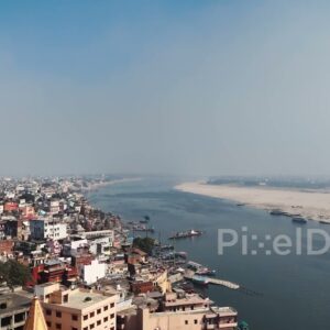 PD0654 - Sweeping Aerial View of Varanasi's Ghats and the Holy Ganges River