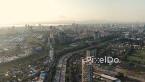 PD0709 - Sweeping Aerial Panorama of the Navi Mumbai Coastal Cityscape