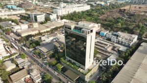 PD0692 - Aerial Orbit of a Modern Luxury Hotel with a Rooftop Pool