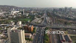 PD0691 - Aerial View of a Major Highway Interchange and Railway in a Modern City