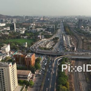 PD0691 - Aerial View of a Major Highway Interchange and Railway in a Modern City