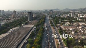 PD0686 - Aerial View of a Major Urban Transportation Corridor with Road and Railway