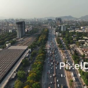 PD0686 - Aerial View of a Major Urban Transportation Corridor with Road and Railway