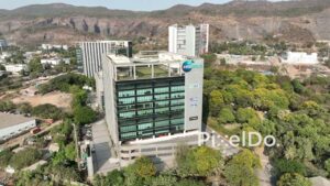 PD0683 - Aerial View of a Modern Business Park with a Mountain Backdrop