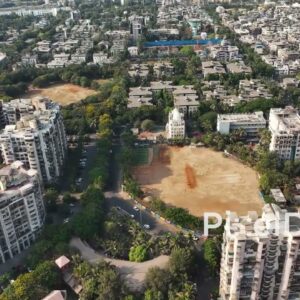 PD0682 - Aerial Orbit of a Residential Neighborhood and Sports Ground in Navi Mumbai