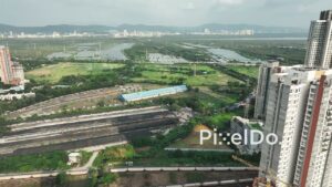 PD0739 - Aerial View of a Railway Freight Yard in a Coastal Metropolis