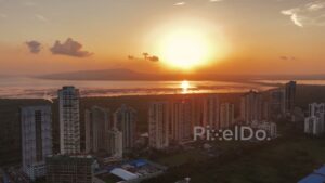 PD0724 - Aerial View of a Residential Skyline Silhouetted by a Brilliant Sunset