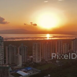 PD0724 - Aerial View of a Residential Skyline Silhouetted by a Brilliant Sunset