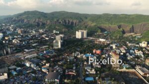 PD0721 - Aerial View of Navi Mumbai's Cityscape at the Base of a Mountain Range