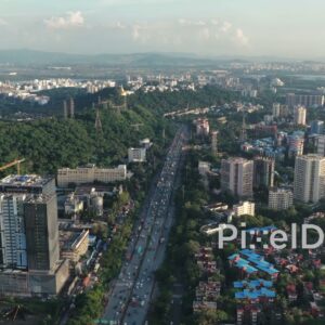 PD0714 - Forward Drone Flight Over the Panvel Highway in a Hilly Urban Landscape