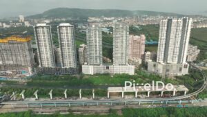 PD0741 - Aerial View of High-Rise Residential Buildings and a Metro Line Under Construction