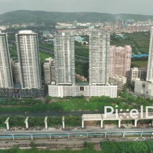 PD0741 - Aerial View of High-Rise Residential Buildings and a Metro Line Under Construction