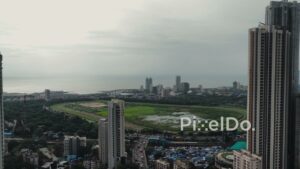 PD0743 - Aerial View of Mumbai's Skyline with the Mahalaxmi Racecourse on an Overcast Day