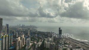 PD0089 - Dramatic Aerial View of the Mumbai Skyline Under a Monsoon Sky