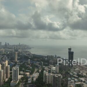 PD0089 - Dramatic Aerial View of the Mumbai Skyline Under a Monsoon Sky