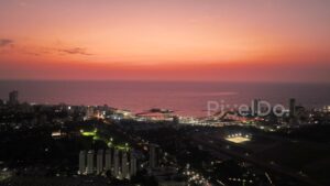 PD0076 - Aerial View of Mumbai's Coastline with Haji Ali and the Coastal Road at Twilight