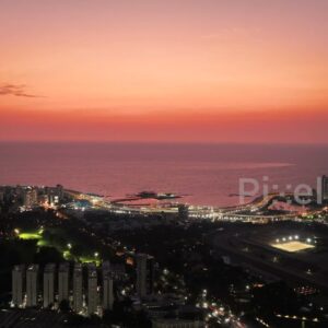 PD0076 - Aerial View of Mumbai's Coastline with Haji Ali and the Coastal Road at Twilight