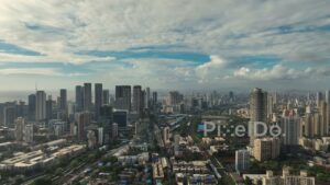 PD0075 - Aerial View of Mumbai's Modern Skyline with the City's Railway Lifeline
