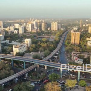 PD0129 - Aerial View of a Complex Urban Interchange with Flyovers and Metro in Mumbai
